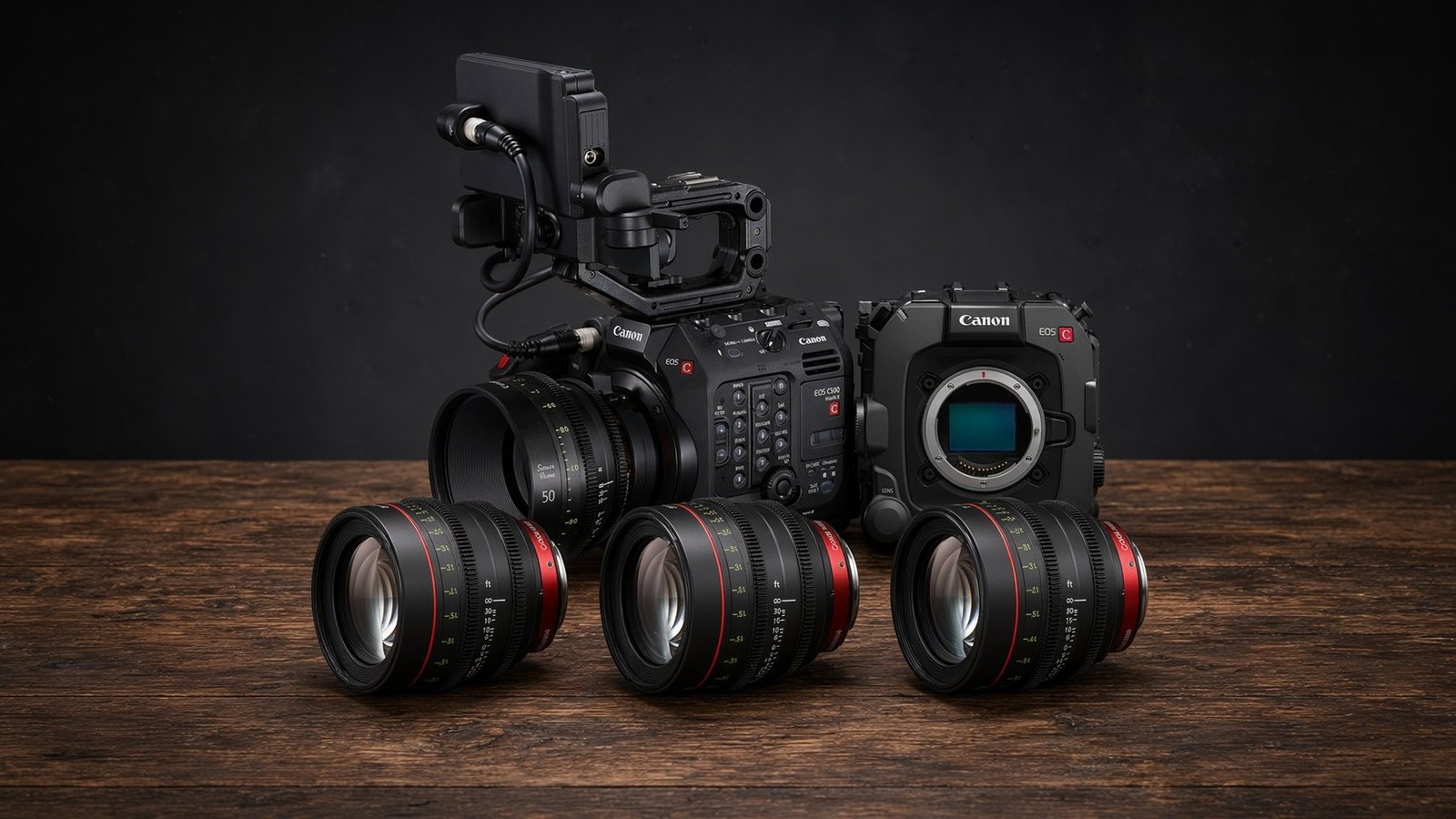 Cinema camera bodies and lenses arranged on a tabletop